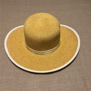 Elegant Tan Wide-Brim Hat with White Trim